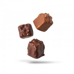 Pralinés mythiques enrobés de chocolat au lait ou chocolat noir.